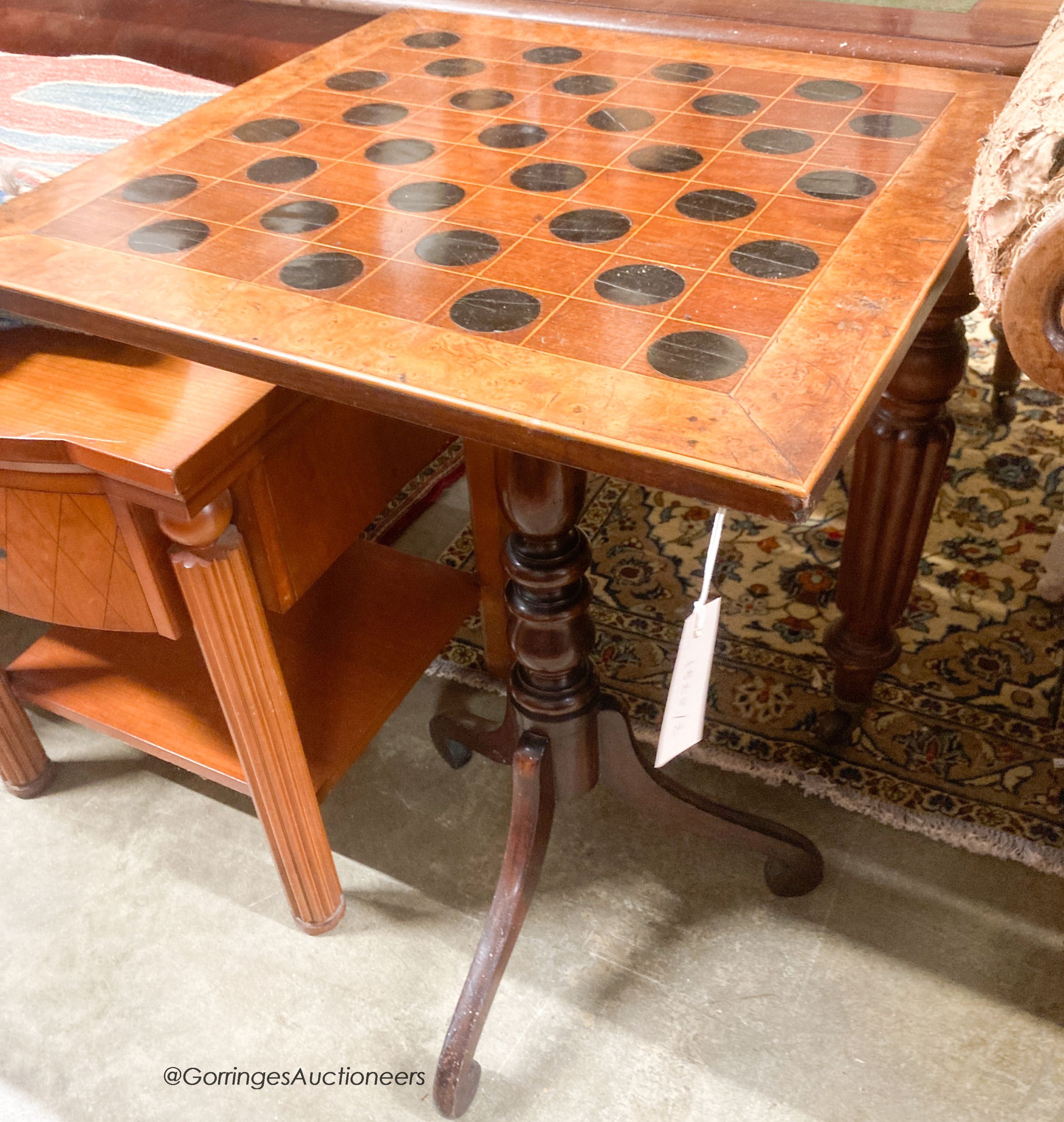 An early 19th century mahogany games top tripod table, width 51cm, depth 51cm, height 77cm